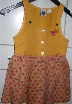 Okerkleurige overgooier (maat 110)