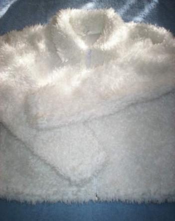 Witte gilet in teddystof maat 152