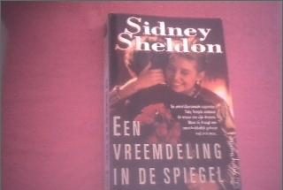 Een vreemdeling in de spiegel - Sidney Sheldon