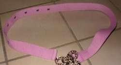 Roze riem met vlindersluiting (±81 cm. lang)