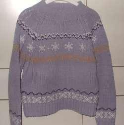 Blauwe pull met motiefjes (134/140)