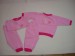 Foto 1 van 2 roze pyjama's, maat 80