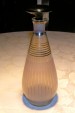 Foto 1 van ART DECO DECANTER MET GROTE ZWARTE STOP