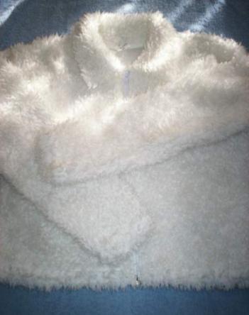 Witte gilet in teddystof maat 152