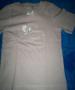 Foto 1 van T-shirt met duifje maat 128