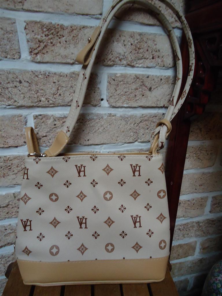 NIEUWE HANDTAS