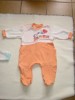 Foto 1 van Oranje pyjama, maat 80