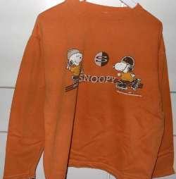Orange snoopy sweater (maat 122/128)
