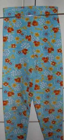 Blauwe legging met bloemetjes (maat 110)