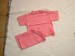 Foto 1 van  2 zalmroze t-shirtjes, van tweeling, maat 68