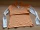 Shirt zacht oranje met vleugeltjes 170/176 