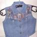 Foto 1 van Jeansvestje zonder mouwen (mt 104)