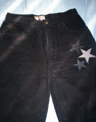 Zwarte veloure pantalon met sterretjes maat 176